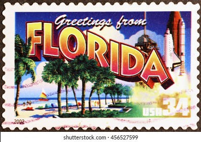 MIlan, Italy - July 21, 2016: Greetings From Florida Postcard On Postage Stamp