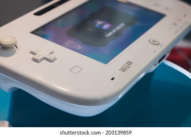 MILAN, ITALY - JULY 3, 2014: Close Up Of White Nintendo Wii U Gamepad Device. Nintendo Is The World's Largest Video Game Company By Revenue.