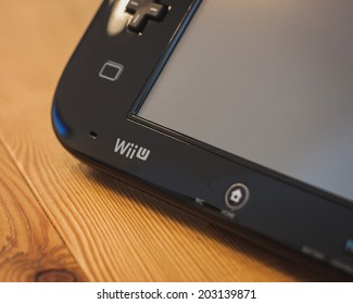 MILAN, ITALY - JULY 3, 2014: Close Up Of Black Nintendo Wii U Gamepad Device. Nintendo Is The World's Largest Video Game Company By Revenue.