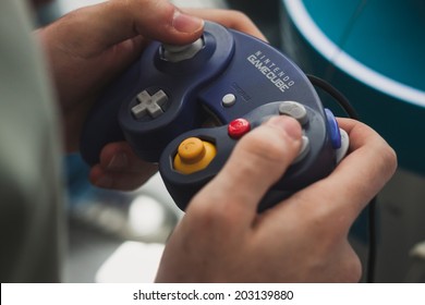 MILAN, ITALY - JULY 3, 2014: Close Up Of Nintendo Gamecube Controller Device. Nintendo Is The World's Largest Video Game Company By Revenue.