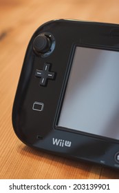 MILAN, ITALY - JULY 3, 2014: Close Up Of Black Nintendo Wii U Gamepad Device. Nintendo Is The World's Largest Video Game Company By Revenue.