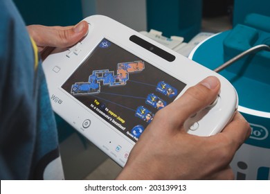 MILAN, ITALY - JULY 3, 2014: Close Up Of White Nintendo Wii U Gamepad Device. Nintendo Is The World's Largest Video Game Company By Revenue.