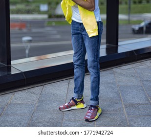 Milan, Italy - July 4, 2020: boy wearing Pharrell Williams Human Race Body and Earth NMD by Adidas on the street - illustrative editorial