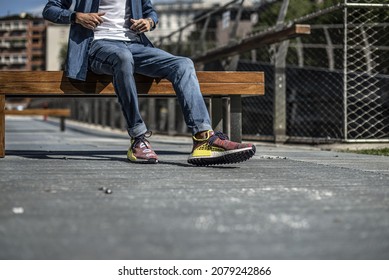 Milan, Italy - July 4, 2020: boy wearing Pharrell Williams Human Race Body and Earth NMD by Adidas on the street - illustrative editorial