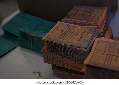 Milan, Italy, June 11, 2022: packet of ballot papers for the referendum on justice of June 12, 2022. Written: "Popular referendum of the Province of Milan, ballot paper".