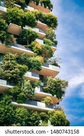 Milan, Italy - June 15, 2019: Green futuristic skyscraper Bosco Verticale, vertical forest building with gardens on balconies. Modern sustainable architecture in Porta Nuova area.