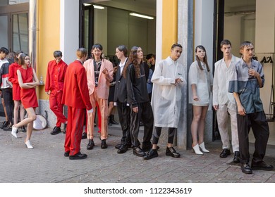 MILAN, ITALY - JUNE 16: Beautiful Models Line Up In The Backstage Just Before M1992 Show During Milan Men's Fashion Week On JUNE 16, 2018 In Milan.