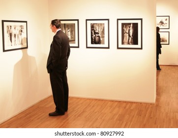 MILAN, ITALY - JUNE 16: People Look At Phil Stern Photos Exhibition At Forma Photography Foundation June 16, 2010 In Milan, Italy.