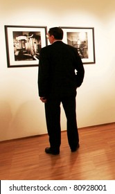 MILAN, ITALY - JUNE 16: People Look At Phil Stern Photos Exhibition At Forma Photography Foundation June 16, 2010 In Milan, Italy.