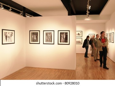 MILAN, ITALY - JUNE 16: People Look At Phil Stern Photos Exhibition At Forma Photography Foundation June 16, 2010 In Milan, Italy.