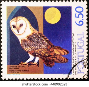 Milan, Italy - June 17, 2016: Barn owl on portuguese postage stamp