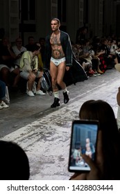 MILAN, ITALY - JUNE 17: Beautiful Model Walks The Runway At David Catalan Show During Milan Men's Fashion Week On JUNE 17, 2019 In Milan.