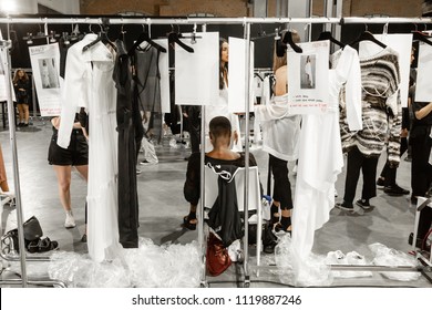 MILAN, ITALY - JUNE 17: Clothes Rack In The Backstage Just Before Isabel Benenato Show During Milan Men's Fashion Week On JUNE 17, 2018 In Milan.