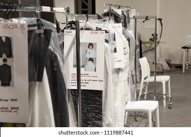 MILAN, ITALY - JUNE 17: Clothes Rack In The Backstage Just Before Isabel Benenato Show During Milan Men's Fashion Week On JUNE 17, 2018 In Milan.