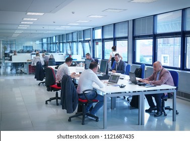 Milan, Italy - June 2018: Business People In An Open Space Office Interior With A Panoramic Window 