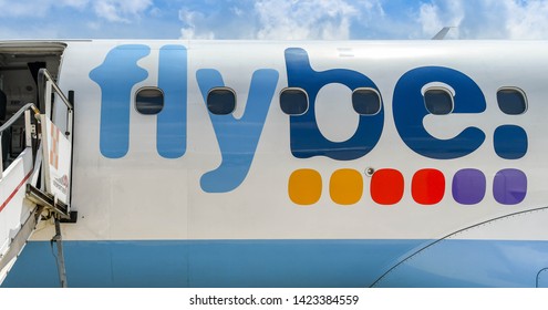 MILAN, ITALY - JUNE 2019: Close Up Of The Flybe Logo On The Side Of An Embraer E175 Jet. The Airline Went Out Of Business In 2020.