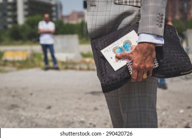 MILAN, ITALY - JUNE 22: Detail Of Bag Outside Gucci Fashion Show Building For Milan Men's Fashion Week On JUNE 22, 2015 In Milan.