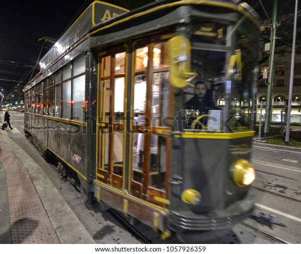 Milan, Italy, Lombardy December 31, 2017. The\
characteristic trams of Milan, historical carriages, carefully\
preserved and restored. In some cases perfectly original, in others\
decorated for the holid
