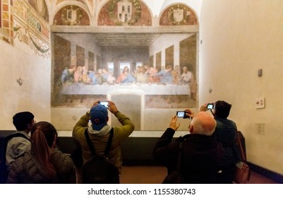 Milan, Italy - March 15, 2016 - People visit Last Supper by Leonardo da Vinci in the refectory of the Convent of Santa Maria delle Grazie
