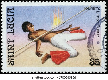 Milan, Italy - March 26, 2020: Acrobatic Limbo Dancer On Postage Stamp Of Saint Lucia