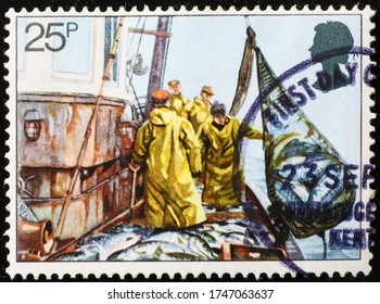 Milan, Italy - March 26, 2020: British Fishermen At Work On Postage Stamp