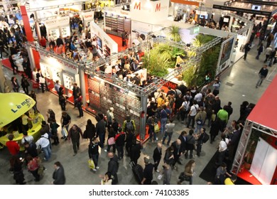 MILAN, ITALY - MARCH 26: Panoramic view of people visiting cameras, lenses and accessories stands at PHOTOSHOW, International Photo and Digital Imaging Exhibition on March 26, 2011 in Milan, Italy.