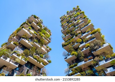Milan, Italy - March 28, 2022: Low angle view of Bosco Verticale (Vertical Wood), a pair of ecological residential towers covered with trees, designed by Boeri Studio, in the Porta Nuova district.