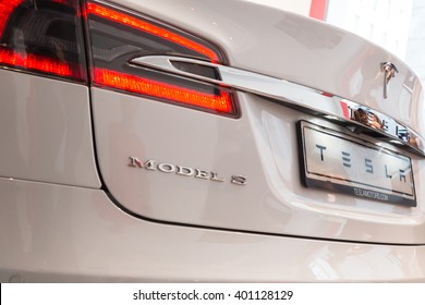 MILAN, ITALY - MARCH 31, 2016: Detail of Tesla Model S 90D car. Tesla Motors  is an American company that designs, manufactures, and sells cutting edge electric cars.