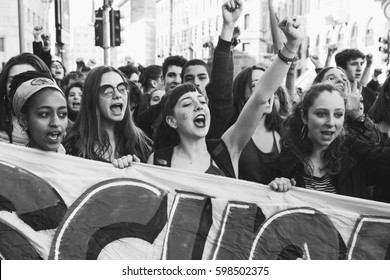 MILAN, ITALY - MARCH 8: Secondary school students take part in a march to celebrate the International Women's Day on MARCH 8, 2017 in Milan.