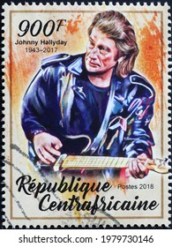 Milan, Italy - May 08, 2021: Johnny Hallyday Palying The Guitar On Postage Stamp