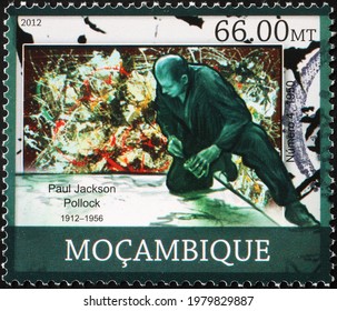 Milan, Italy - May 08, 2021: Jackson Pollock Painting On Postage Stamp