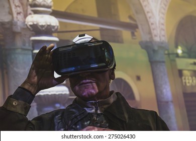 MILAN, ITALY - MAY 1: Man Tries Virtual Reality Headset At Expo, Universal Exposition On The Theme Of Food On MAY 1, 2015 In Milan.