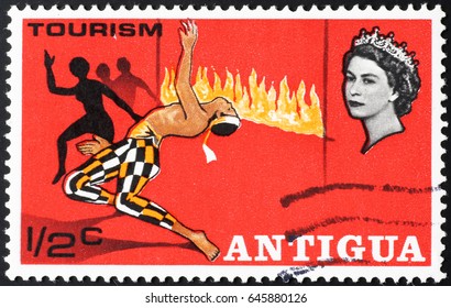 Milan, Italy - May 14, 2017: Limbo Dancer On Vintage Postage Stamp Of Antigua