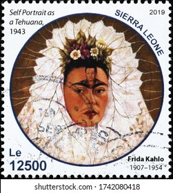 Milan, Italy - May 19, 2020: Self Portrait By Frida Kahlo On African Stamp