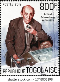 Milan, Italy - May 20, 2020: Portrait Of Composer Arnold Schoenberg On Postage Stamp