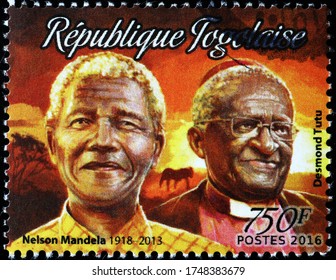 Milan, Italy - May 20, 2020: Portraits Of Nelson Mandela And Desmond Tutu On African Postage Stamp