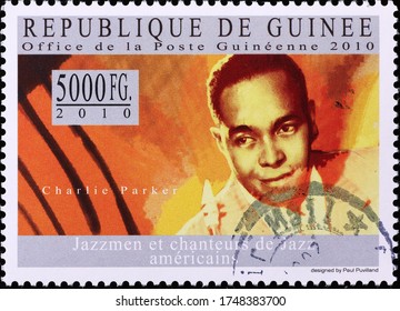 Milan, Italy - May 20, 2020: Charlie Parker On Postage Stamp Of Guinea