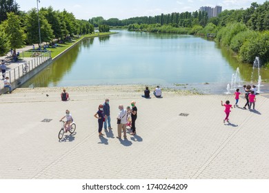 MILAN, ITALY - MAY 24, 2020: Italy Eases Some Lockdown Restrictions As Coronavirus Infection Rate Falls - People In Parco Nord, Milan.