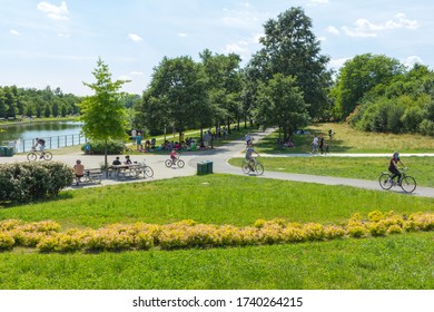 MILAN, ITALY - MAY 24, 2020: Italy Eases Some Lockdown Restrictions As Coronavirus Infection Rate Falls - People In Parco Nord, Milan.