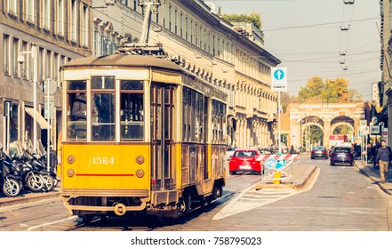 MILAN, ITALY - November 03, 2017 : Old Yellow Tram Of The Public Transport Company Of The City Of Milan Circulating In The Paved Streets