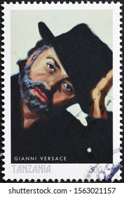 Milan, Italy - November 09, 2019: Famous Stylist Gianni Versace On Postage Stamp