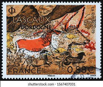 Milan, Italy - November 09, 2019: Prehistoric depictions of Lascaux on french stamp