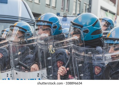 MILAN, ITALY - NOVEMBER 13: Riot Police Confronting The Students During A March In The City Streets To Protest Agaist The Public School Management On NOVEMBER 13, 2015 In Milan.