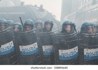 MILAN, ITALY - NOVEMBER 13: Riot Police Confronting The Students During A March In The City Streets To Protest Agaist The Public School Management On NOVEMBER 13, 2015 In Milan.