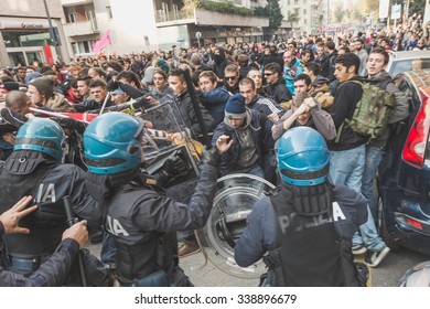 MILAN, ITALY - NOVEMBER 13: Students Confront Police During A March In The City Streets To Protest Agaist The Public School Management On NOVEMBER 13, 2015 In Milan.