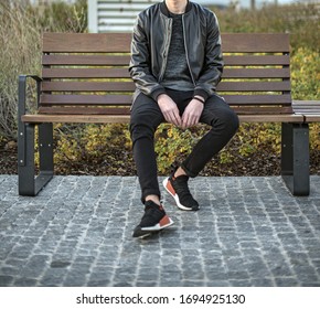 Milan, Italy - November 18, 2017: Young man wearing Adidas NMD 2 shoes in the street - illustrative editorial