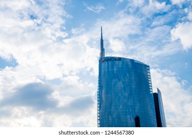 Milan, Italy - November 25, 2018: Skyscraper In Milan, The Headquarters Of The Unicredit Bank Offices, Designed By César Pelli, With Background Of Cloudy Sky.