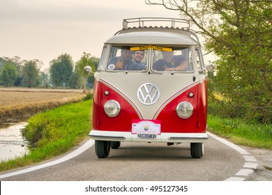 MILAN / ITALY - OCTOBER 01, 2016: a vintage German Volkswagen Transporter van traveling on a rural road