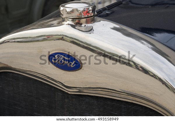 MILAN / ITALY - OCTOBER 01, 2016:\
Closeup of an old Ford logo on a vintage car\
model