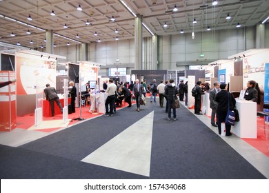 MILAN, ITALY - OCTOBER 19: People visit technologies exhibition area during SMAU, international fair of business intelligence and information technology October 19, 2011 in Milan, Italy. 